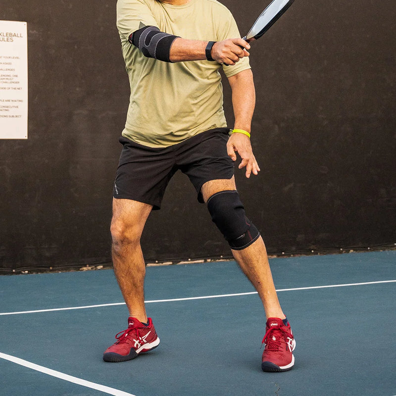 Pickleball Player Wearing Protective McDavid Knee Support with Sorbothane® Pad