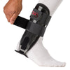 McDavid Ankle Splint - Black - On Model - Front View - Tightening Velcro Straps